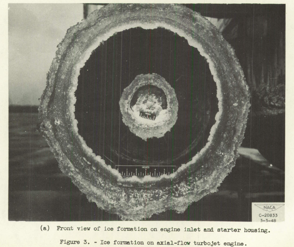 Figure 3a. Ice formation on axial-flow turbojet engine. Front view of ice formation on engine inlet and starter housing.