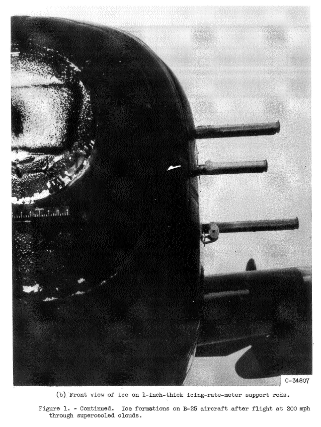 Figure 1b. Front view of ice on 1-inch-thick icing-rate-meter support rods.